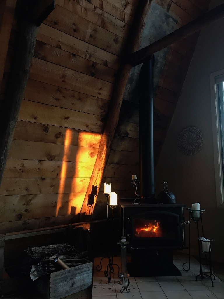 Morning sun on cabin wall.